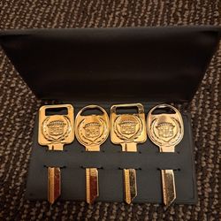 Four Cadillac Gold Blanks Keys 