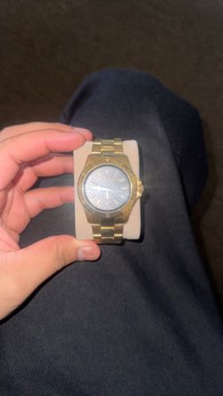 MK gold watch