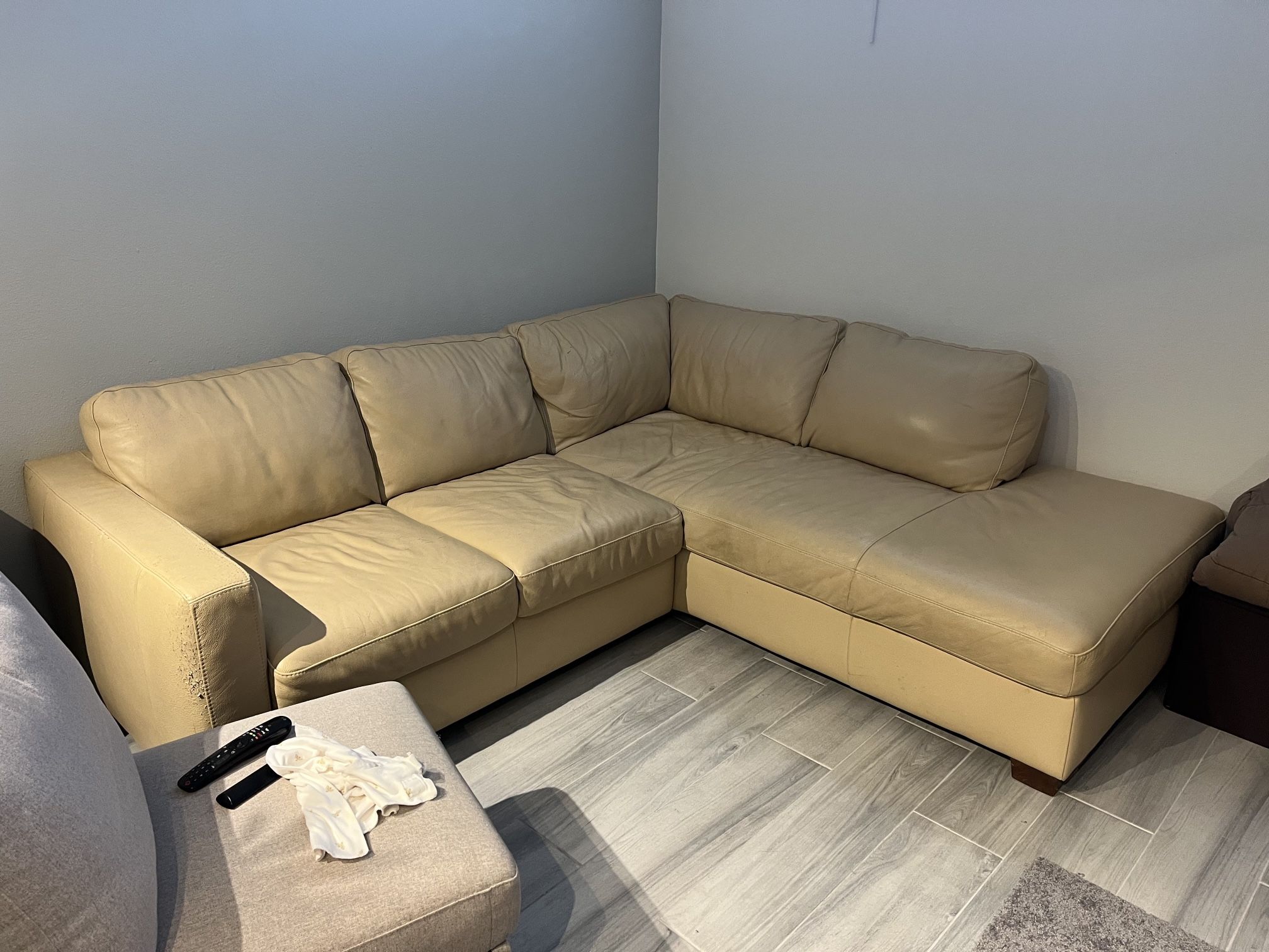 Beige L sofa/couch with chaise lounge