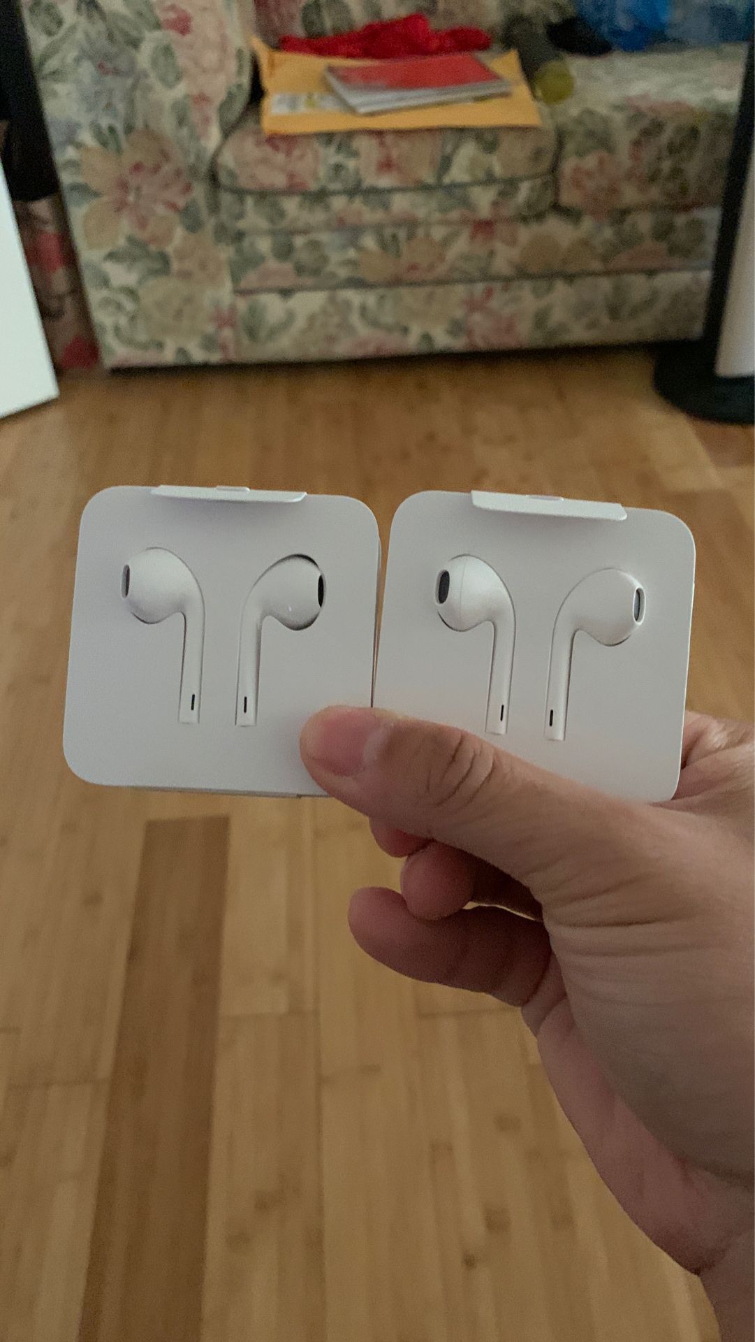 (2) new Apple headphones with lightning connector