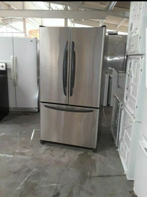 refrigerator brand kenmore water and internal ice measures 36 wide and 70 high 3 months warranty delivery and installation