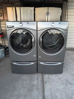 Whirlpool Front Load Washer and Electric Dryer