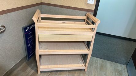 Changing table with drawer