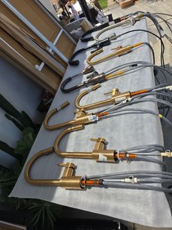 Moem kitchen faucet little damage $55 each