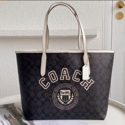 Coach City Tote In Signature Canvas With Varsity Motif