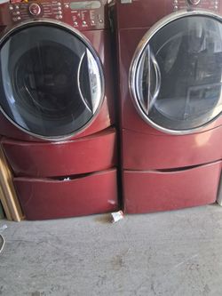 Set of Kenmore elite front load washer large capacity and gas dryer with pedestal fully functional