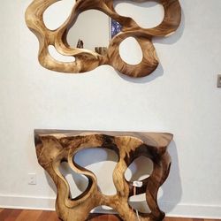 Stunning, one-of-a-kind handcrafted wood console table with matching sculptural wall mirror.