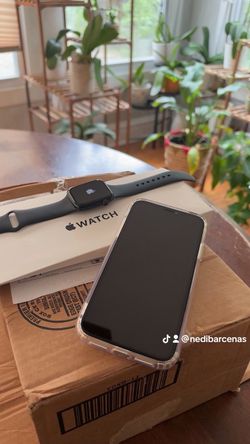 apple 🍎 watch and cell phone