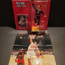 Miami Heat Alonzo  mourning signed 1996 starting lineup figure and unsigned 8 X 10 photo