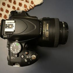 Nikon D5100 with Nikon AF-S DX NIKKOR 35mm f/1.8G Lens with Auto Focus