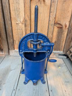 Vintage sausage stuffer and fruit press