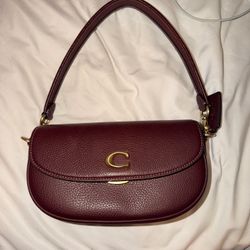 Coach Pebbled Cross Body Purse In Color Merlot 