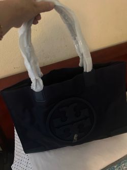 Linda bolsa Tory por $95