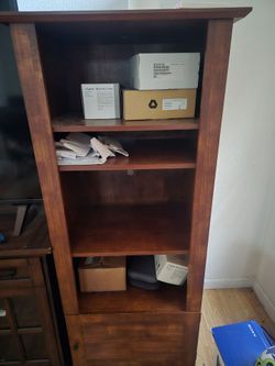 Two shelfs with cabinet at bottom