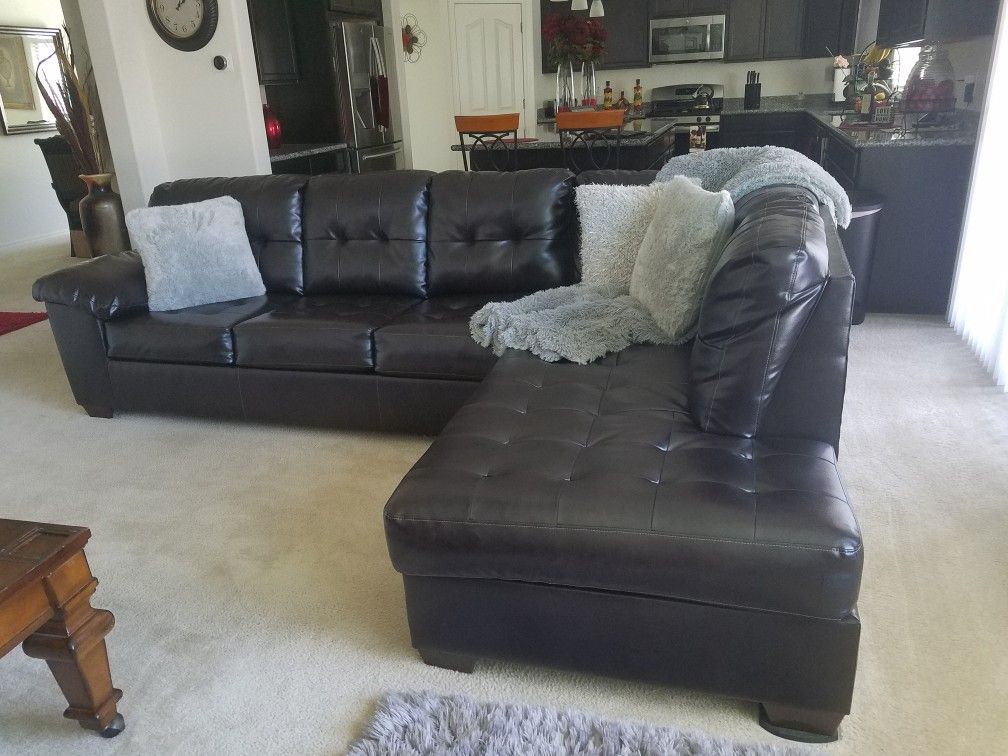 Brown 2 Piece Sectional w/Brown Wooden Coffee Table n Two End Tables w/ Both Lamps