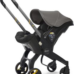 Doona Infant Car Seat/ Compact Stroller System With Base