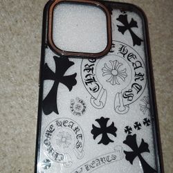 Chrome Hearts-themed iPhone case with a black and white cross pattern.