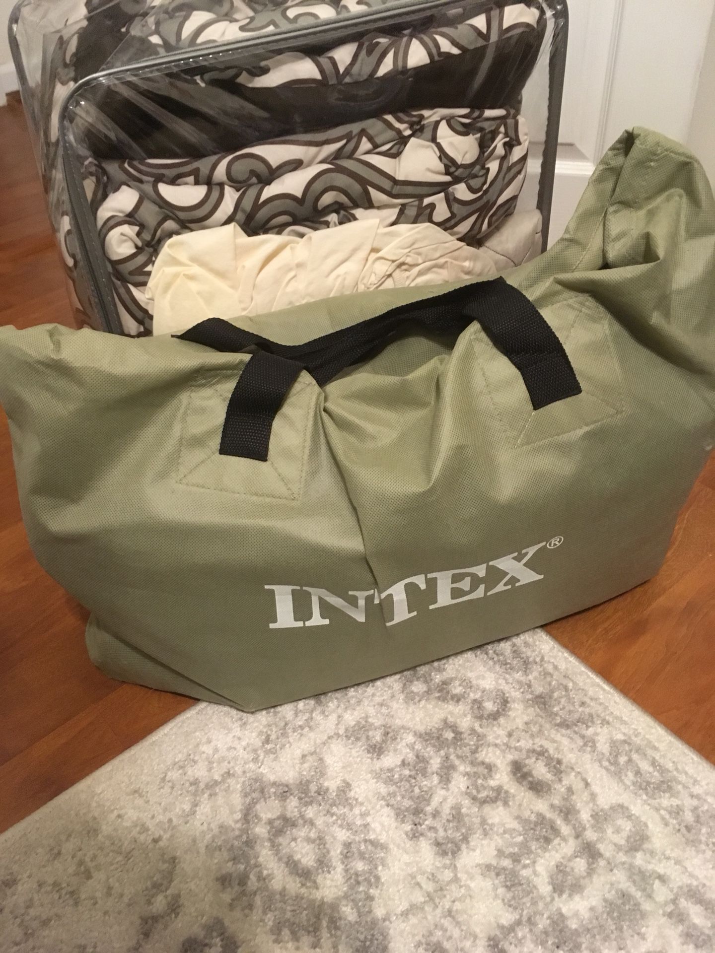 Intex Inflatable Queen Mattress with Pump & Linens