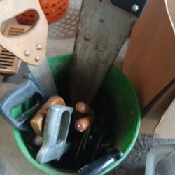 Bucket Of Hand Saws And Related