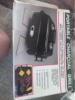 Portable charcoal grill