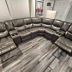 Summer clearance sale. Madrid, leather reclining sectional in gray or black only $1499. Easy finance option. Same day delivery.