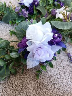 2 Artificial Flower Garland wreaths for table decor

Condition is used twice
$110 for longest wreath
$100 for shorter

Measurement of each arrangement