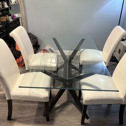 Glass Table and Leather Chairs
