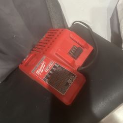 Milwaukee drill and charger