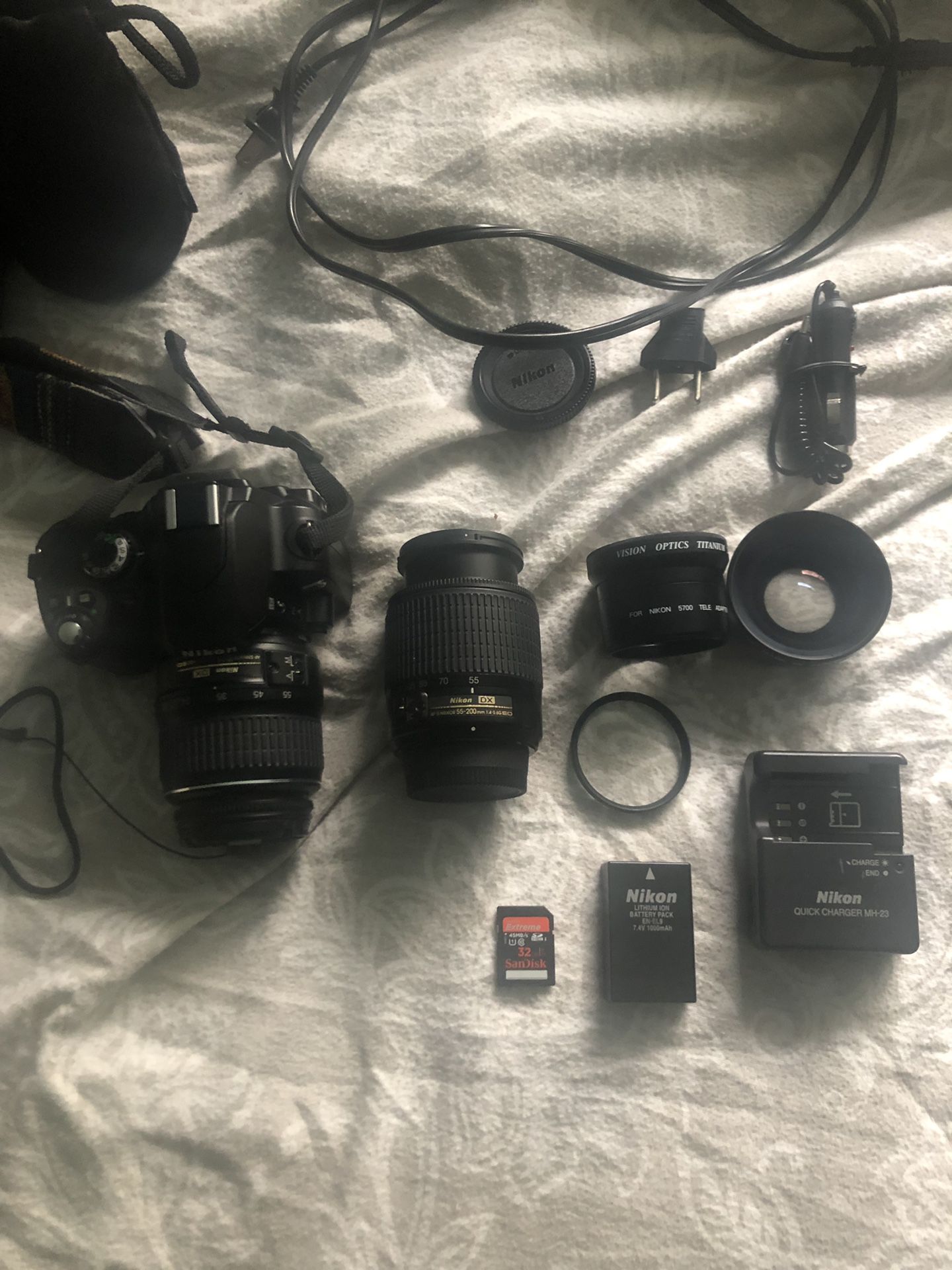 Nikon D40x with 4 lenses, 32GB card, charger, and case
