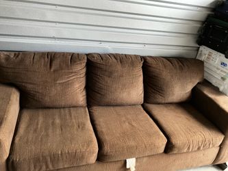 Brown sofa and loveseat set