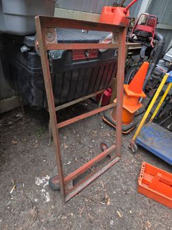 Heavy-duty steel rolling frame/cart for sale. Solid welded steel construction with large industrial casters. Great for moving heavy equipment, machine