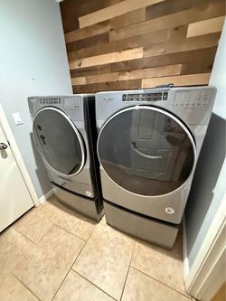 Whirlpool Washer & Dryer on Storage Base