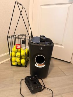 Proton tennis ball machine