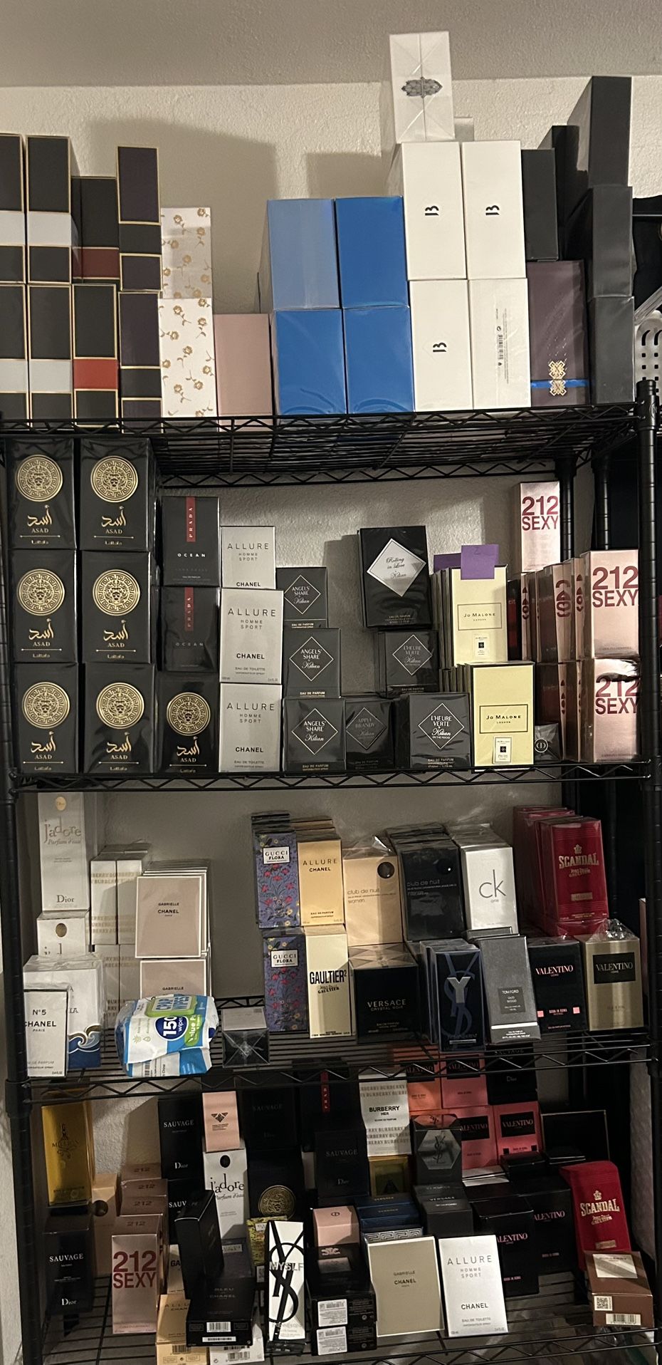 A bunch of perfumes and colognes