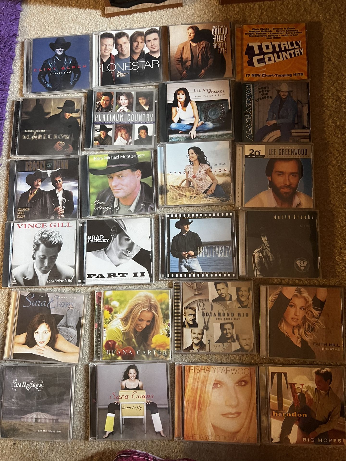 Assorted CDs. CD Carry Cases.