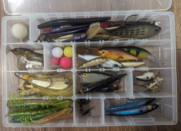 Fishing tackle box full of lures
