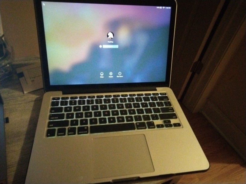 MacBook Pro  And HP 19" All-in-one PC