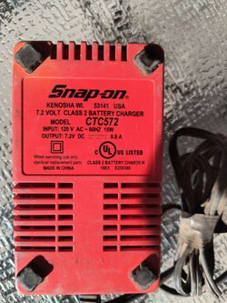 Snap on battery charger