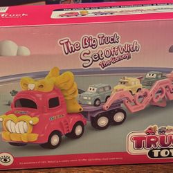 The Big Truck Set Off With The Convoy" toy carrier truck. 