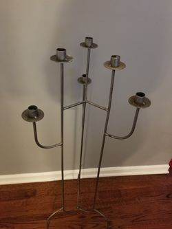 Wrought Iron candle holder 41 inches tall.