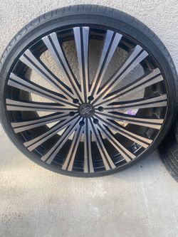 Set of 26” rims and tires