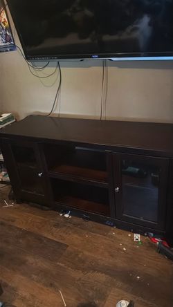 Dark Brown Wood TV Stand with Glass Doors