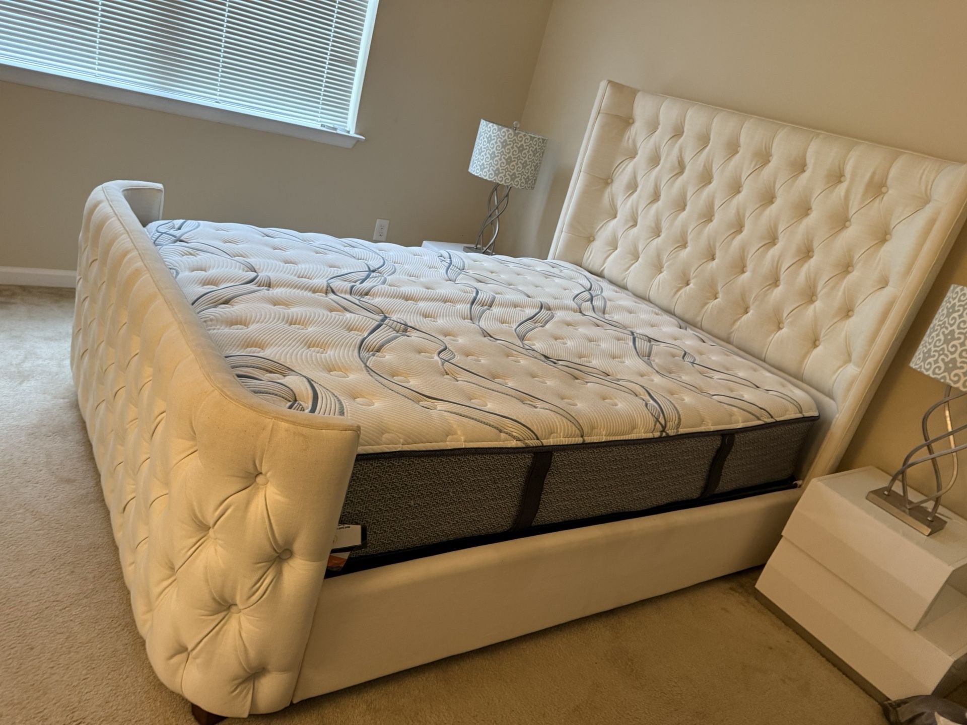 Queen bed with tufted, headboard, and footboard
