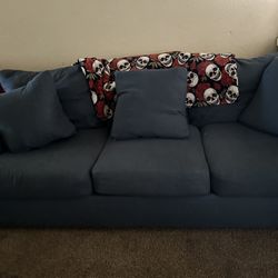 2 Couches and Orange Chair