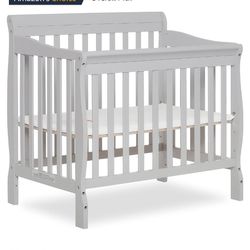 Baby Crib And 2 Mattresses 