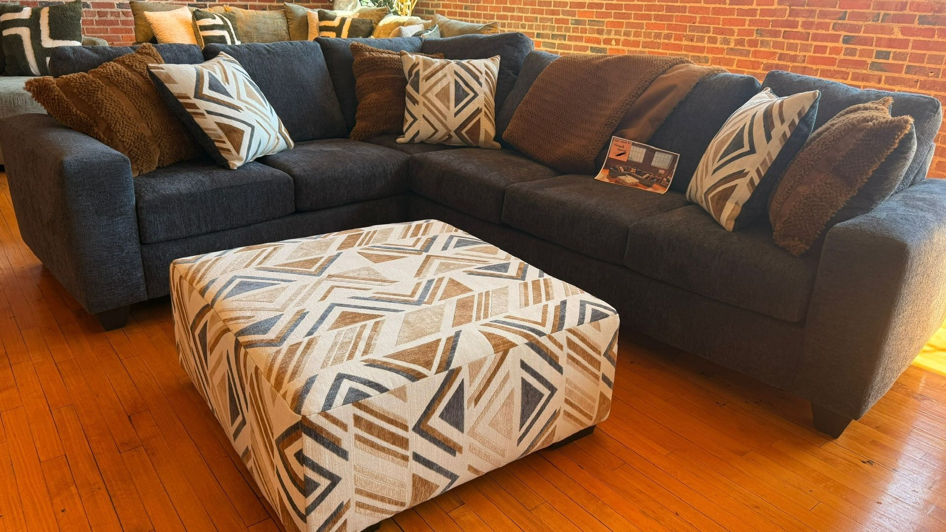 New Marquette 2 pc sectional sofa with ottoman and pillow by Albany