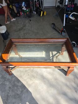 Glass top coffee table