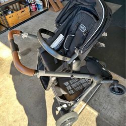 evenflo pivot travel system 