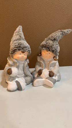Christmas boy and girl figurines