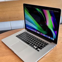 Apple MacBook Pro with 15” Retina Display quad core intel i7 processor 16GB RAM 256GB FLASH STORAGE SSD $345